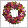 MED WHITE WREATH WITH FEATURE